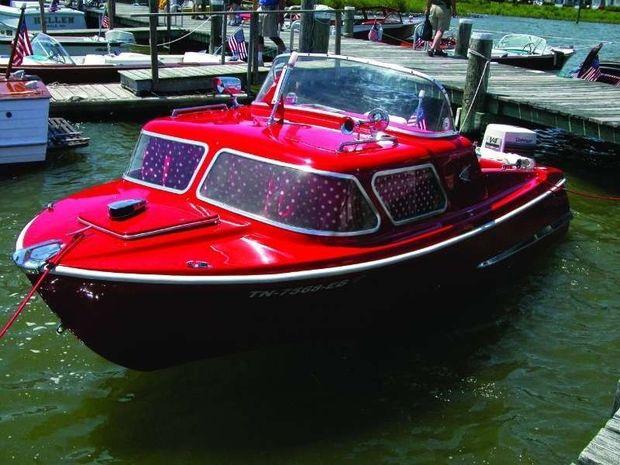 A Pennant Red 16' 8" Dorsett Boat at a pier in St. Michaels, MD. Raymond Lowery put his signature streamlined design on his Cambridge-made boat.