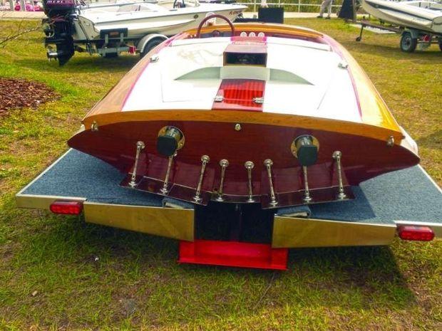 This G-3 Glaspar outboard boat converted to an inboard. Wood was added to the fiberglass boat on the transom, center stripe, dashboard, and steering wheel.