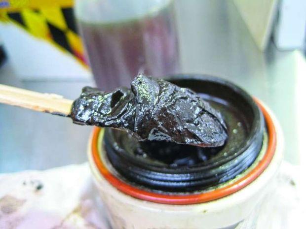 Extreme sludge build up, like that shown here, is a sign of a serious problem. It eventually leads to varnish formation and lubrication starvation. Extreme sludge build up, like that shown here, is a sign of a serious problem. It eventually leads to varnish formation and lubrication starvation.