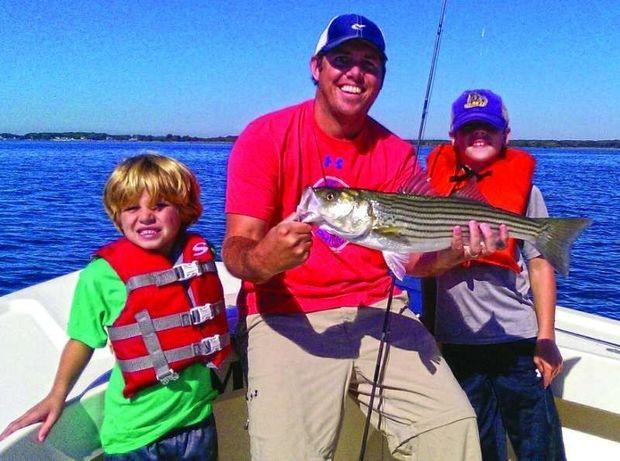 Mike Kelly and his sons Colin and Mathew scored keeper rockfish with Captain Jeff Lewatowski. Photo courtesy of Lew's Fly Guide
